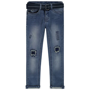 Jean effet used à trous et ceinture repositionnable 
