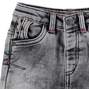 Jean effet used et crinkle à usures et poches 