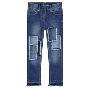 Jeans slim à patchs et franges effet used 
