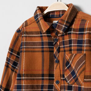 Chemise manches longues à carreaux  et poche 