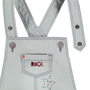 Salopette courte en jeans effet used avec broderies style rock 