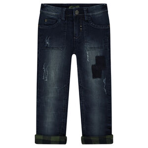 Jeans effet used doublé flanelle à carreaux 