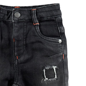 Jean effet used et crinkle avec surpiqûres contrastées 