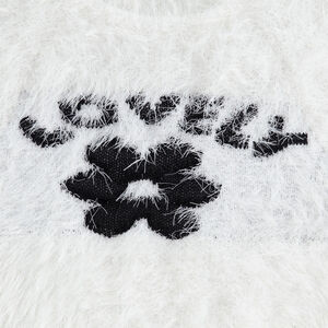 Pull en tricot poil avec motif fleur en jacquard 