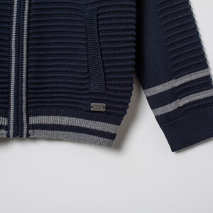 Gilet en maille fantaisie zippé à col teddy 