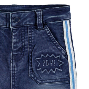 Jean effet used et crinkle à bandes sur les côtés 