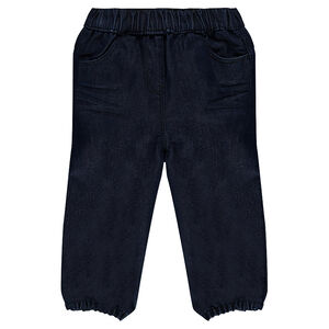 Jeans brut à taille et chevilles élastiquées 