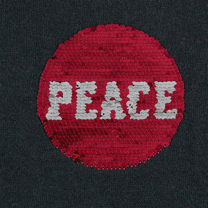 Robe manches courtes en tricot avec motif en sequins magiques 