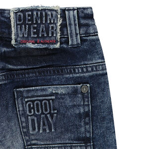 Jeans effet used et crinkle avec déchirures  