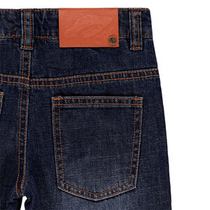 Jeans effet used et crinkle avec doublure en flanelle à carreaux 