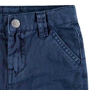 Pantalon en coton surteint avec larges poches à rabat 