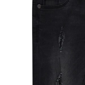 Jeans effet used et crinkle avec déchirures fantaisie 