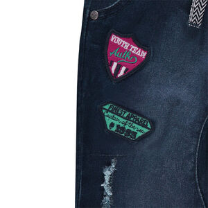 Jeans en molleton effet denim used avec badges 