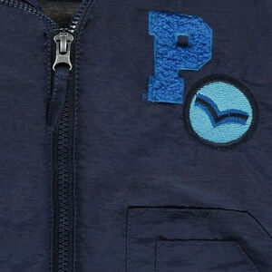 Parka à capuche ouatinée doublée jersey avec badges fantaisie 