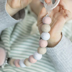 Attache sucette en silicone Rose pointillé 