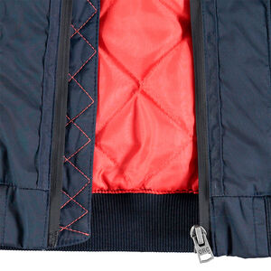 Junior - Teddy bleu uni avec doublure imprimée et poche zippée 