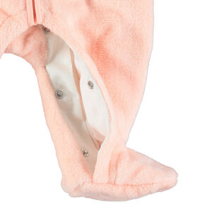 Combi-pilote en sherpa orangée avec ouverture zippée et badge Smiley 