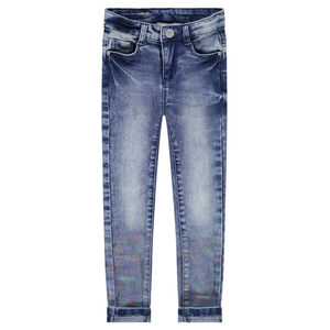 Jeans effet used avec enduction arc-en-ciel 