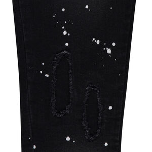 Jeans used avec effet taches de peinture 