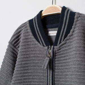 Gilet en maille fantaisie zippé à col teddy 