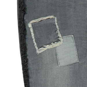 Jeans skinny effet used avec fleurs brodées et galons frangés 