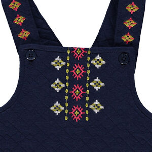 Salopette en molleton fantaisie et broderies 