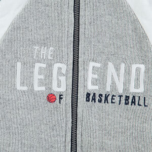 Jogging en molleton avec inscription brodée et poches zippées 