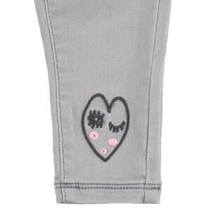 Jeans effet used avec coeurs en sherpa 