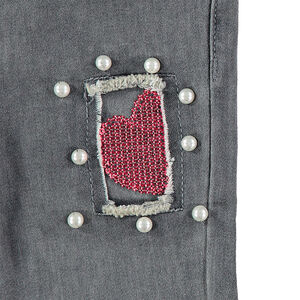 Jeans effet used et crinkle avec fantaisies sur les jambes 