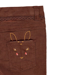 Pantalon slim en velours avec faon brodé et galon dentelle  