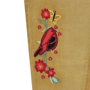 Jeans effet used avec oiseau et fleurs brodés sur les jambes  