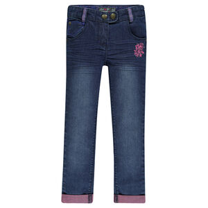 Jeans slim effet used avec broderie fantaisie 