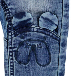 Jeans effet used et crinkle avec oreilles en relief  
