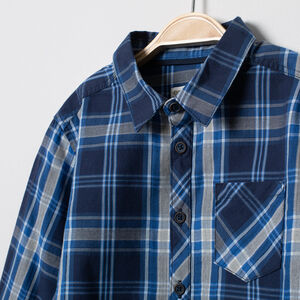 Chemise manches longues à carreaux bleus et poche 