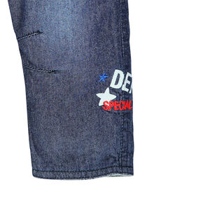 Jeans effet used doublé jersey avec print fantaisie 