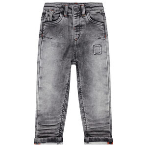 Jean effet used et crinkle à usures et poches 