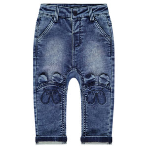 Jeans effet used et crinkle avec oreilles en relief  