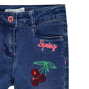 Jean slim effet used à broderies et sequins 