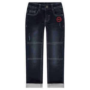 Jeans effet used et crinkle avec badge brodé et découpes 