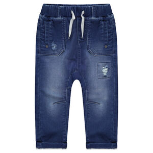 Jeans effet used avec taille élastiquée et baleine brodée au dos 