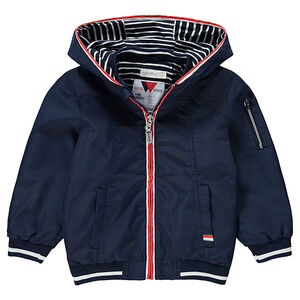 Coupe-vent uni à capuche avec doublure en jersey 