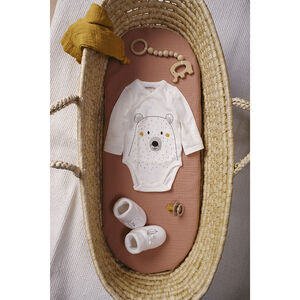Chaussons en coton motif plumes brodées 
