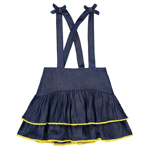 Robe salopette volantée en chambray avec galons à pompons 