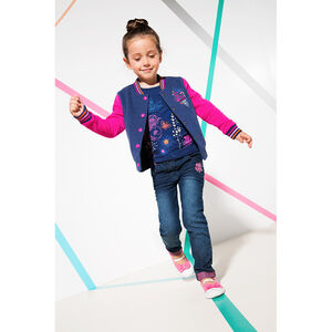 Jeans slim effet used avec broderie fantaisie 
