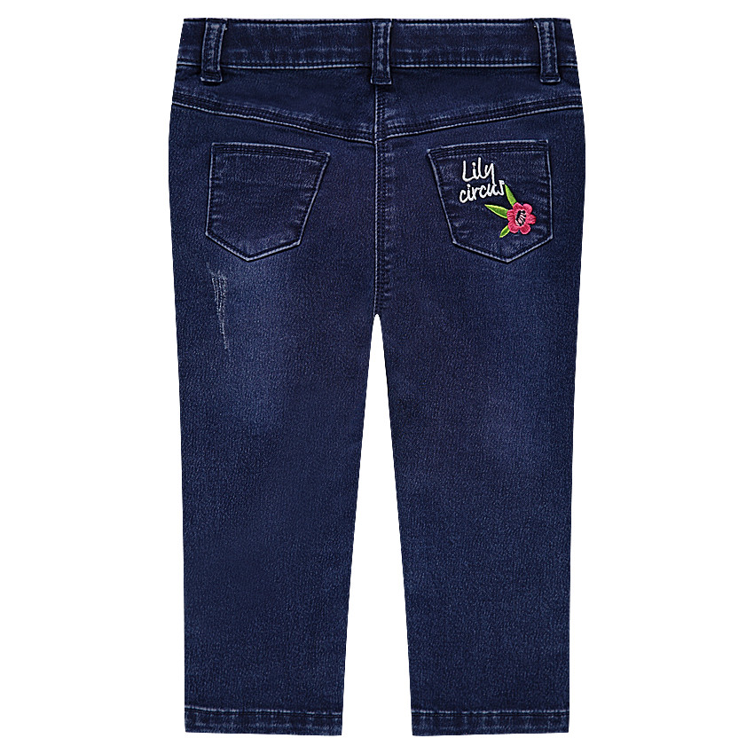 Jeans en moleton effet used avec broderies et découpe forme chat  