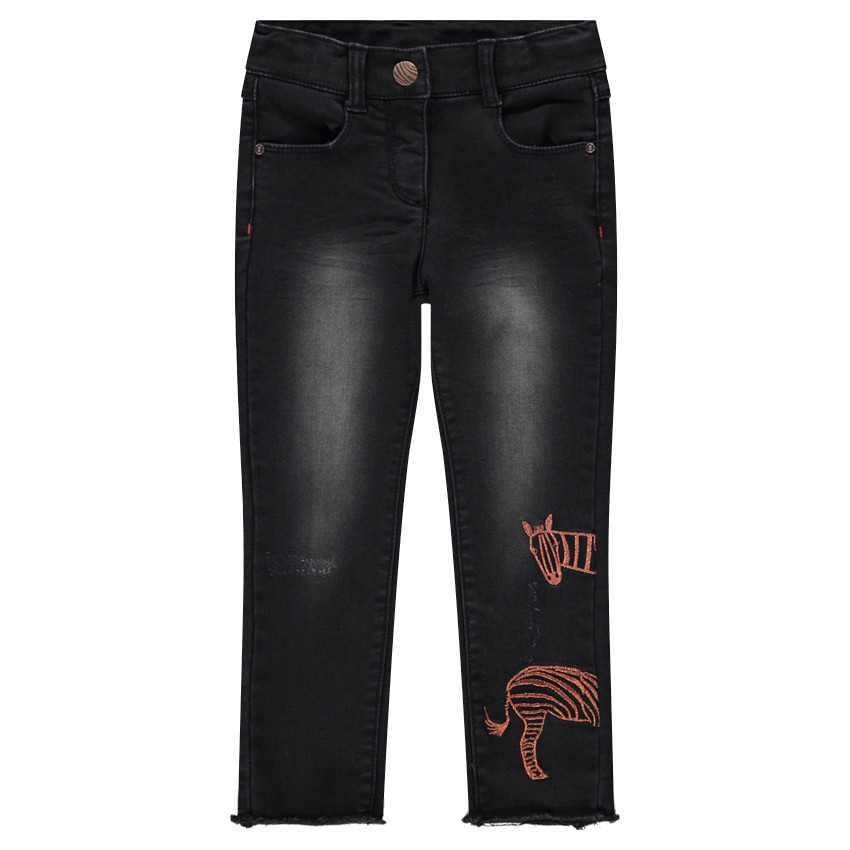 Jeans skinny effet used avec zèbre brodé 