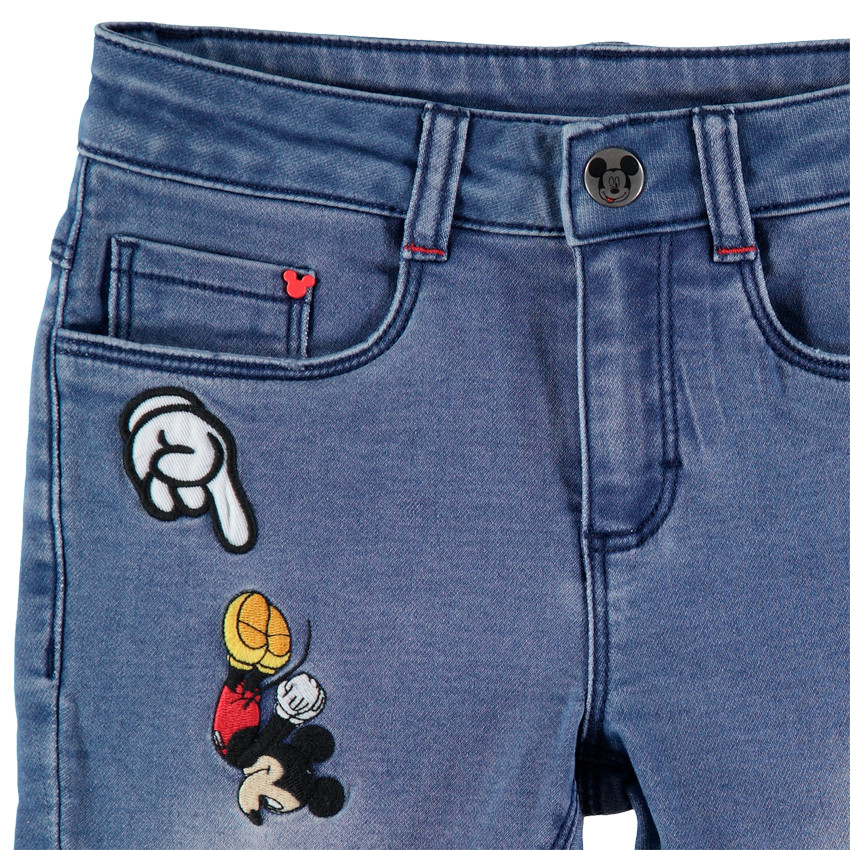 Jean slim effet used à badges Mickey Disney 