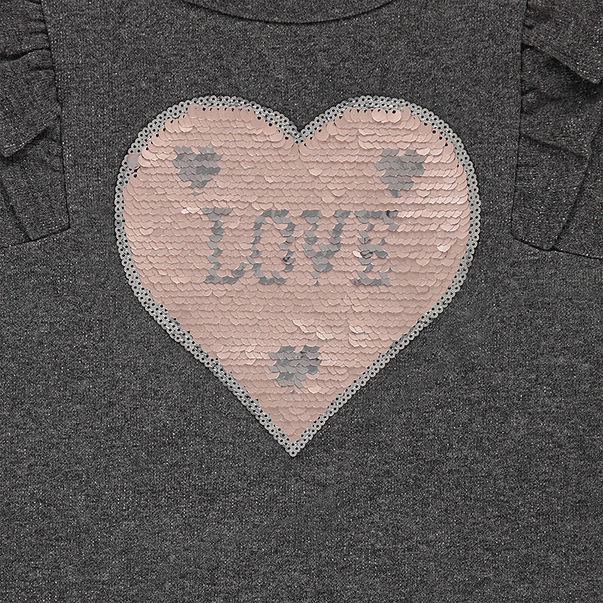 Sweat en molleton avec volants et coeur en sequins magiques 