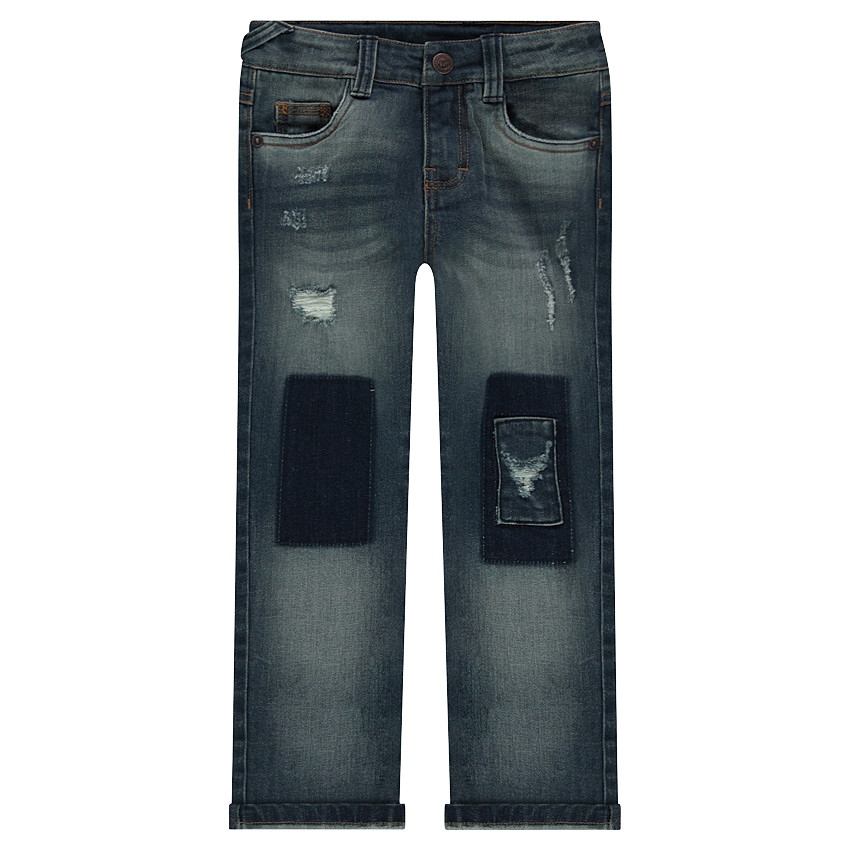 Jeans effet used et crinkle avec ombres et déchirures 