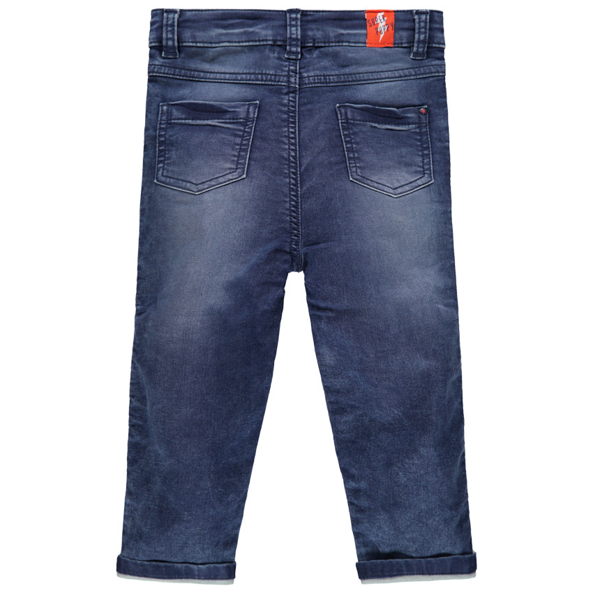 Jean effet used et crinkle à bandes sur les côtés 